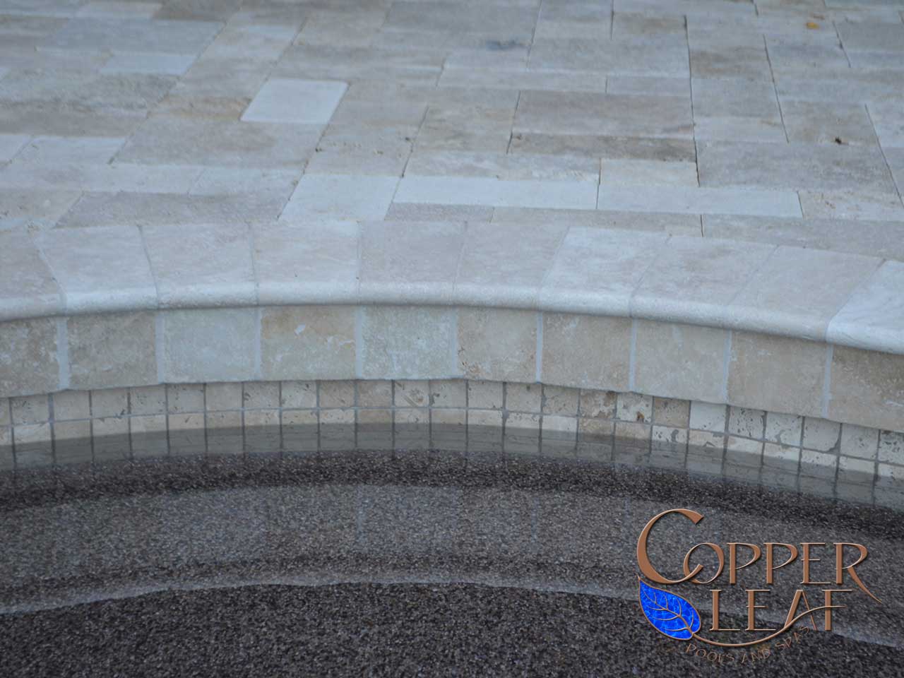 Travertine Coping in North Scottsdale Copper Leaf Pools